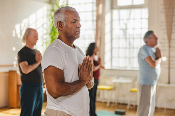 istock Yoga Participants Following Instructions And Postures During Class 1483599572