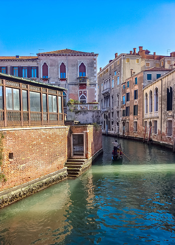 Venice, Italy - April 2023. Venice canals with houses of the city. You can see a mode of life