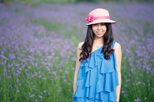 A Chinese young women playing in the vast lavender