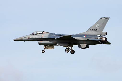 Leeuwarden / Netherlands - April 13, 2015: Royal Netherlands Air Force Lockheed Martin F-16AM Fighting Falcon J-632 fighter jet arrival and landing at Leeuwarden Air Base for Frisian Flag 2015 Air Exercise