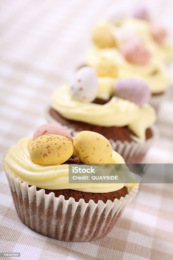 Easter cupcakes freshly baked Easter cupcakes with focus being to front cupcake Baked Stock Photo