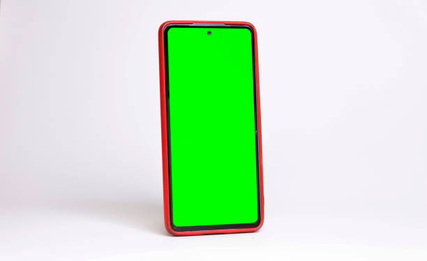istock Cell phone with green screen, sideways, on white background with shadow, horizontal, with red case 1483626743