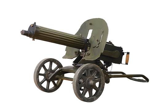 Military old maxim machine gun on a white background isolated