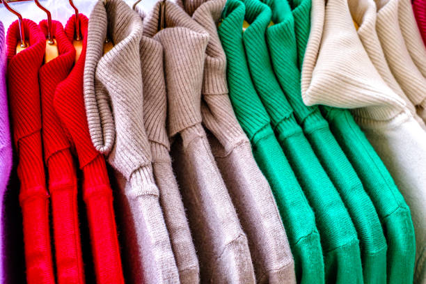 одежда на вешалке - polo shirt multi colored clothing variation стоковые фото и изображения