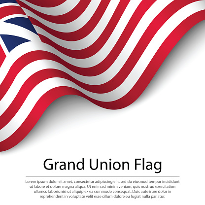 Waving Grand Union Flag on white background. Banner or ribbon vector template