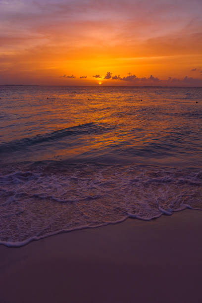Sea beach with sky sunset or sunrise. Clouds over the sunset sea. Sunset at tropical beach. Nature sunset landscape of beautiful tropical sea.