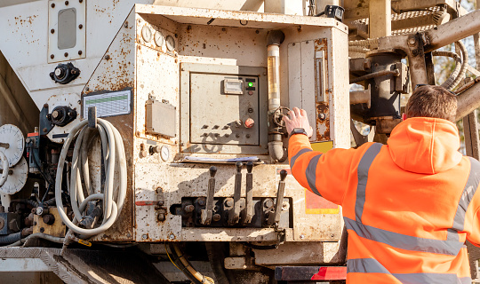 Concrete delivered on the construction site and offloaded from a volumetric concrete mixer