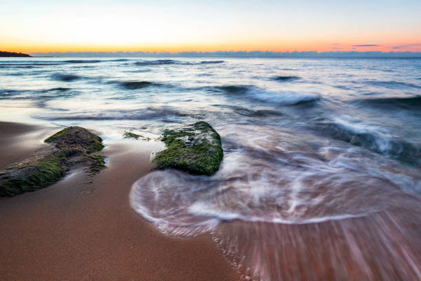 istock sunrise over the sea. 1483641475