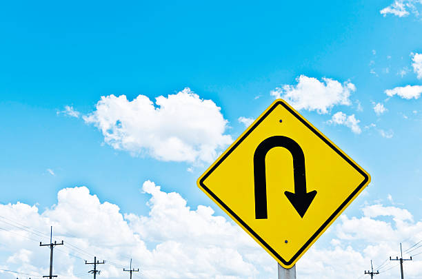 istock u-turn symbol and blue sky 148364485