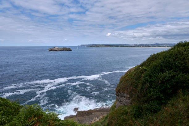 istock A lighthouse on the Cantabrian Sea coast, and coast line 1483647428