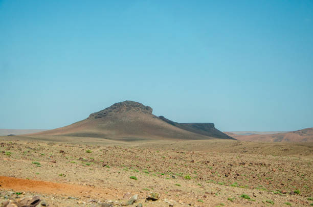 istock Desert landscapes in Morocco. Climate change and arid climate. Desertification and lack of water. Mountains and hills on the horizon 1483649042