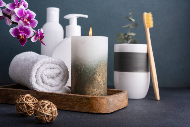 istock Beautiful burning candle and bathroom accessories. 1483650214
