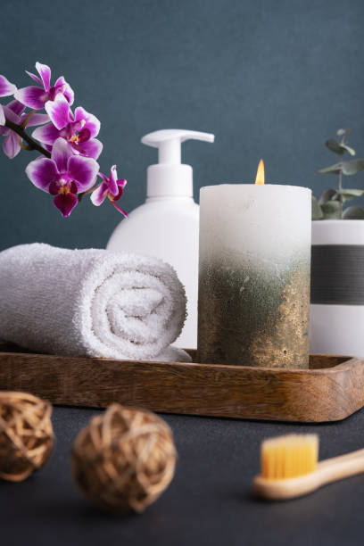 istock Beautiful burning candle and bathroom accessories. 1483650229