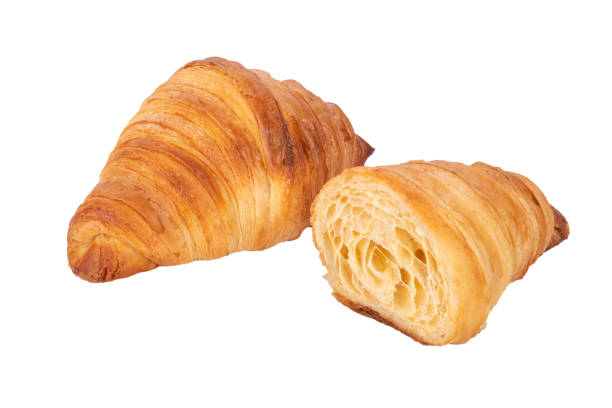 istock One plain croissant and half cut croissant isolated 1483653773