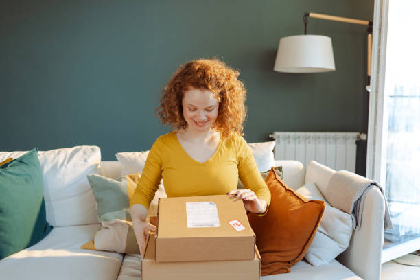 istock Online order has arrived to the female customer 1483655763
