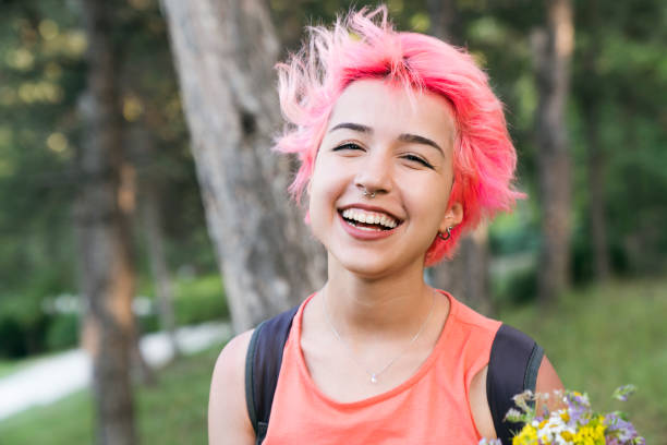 Portrait of a non-binary person with dye hair