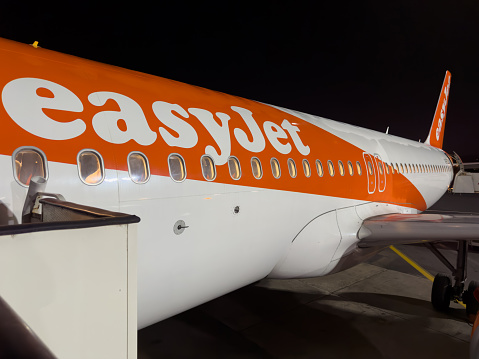 Crete, Greece - April 5th 2023: Airplane of the company Easyjet parked for boarding and disembarkation of passengers. EasyJet, is a British low-cost airline based at London Luton Airport. It operates domestic and international scheduled services on over 1,000 routes in more than 30 countries.