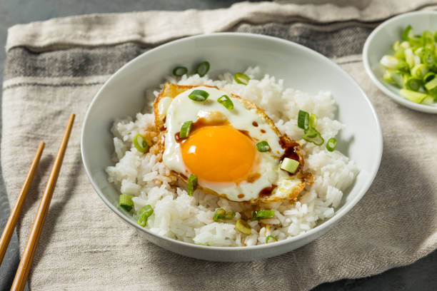 istock Homemade Asian Fried Egg and Rice Breakfast 1483663657