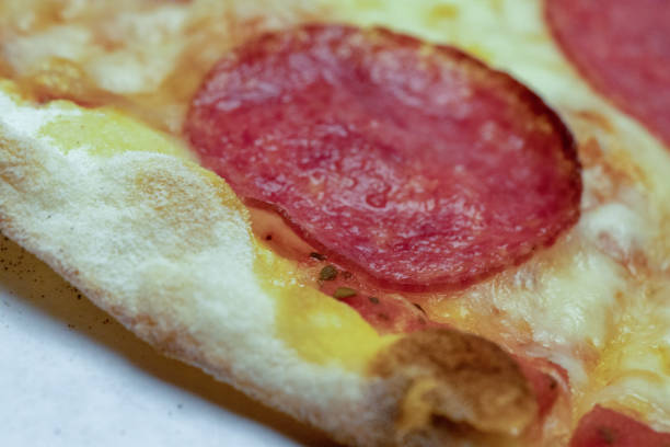 Pepperoni pizza with mozzarella cheese. Italian cuisine.