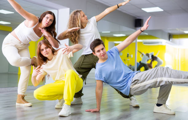 istock Team of teenagers dancing modern dances in studio 1483674915