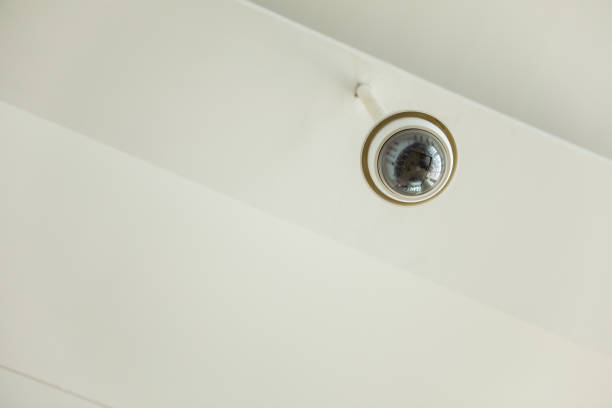 security camera in the image represents the use of technology for safety and protection. It symbolizes surveillance and monitoring as a means of preventing crime and detecting security breaches
