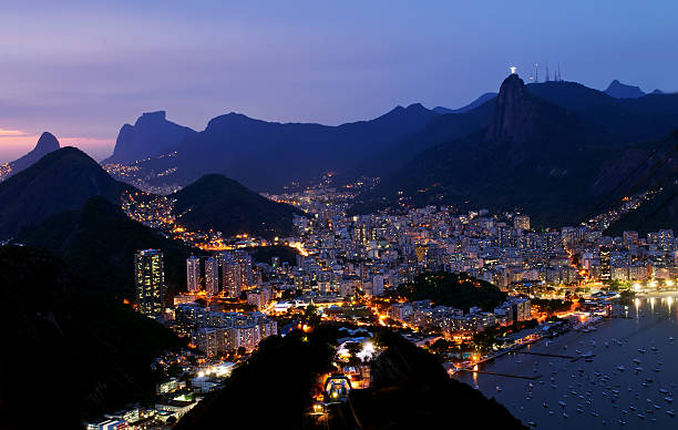 Night view Botafogo in Rio de Janeiro Night view Botafogo and Yacht club from Sugar Loaf in Rio de Janeiro corcovado stock pictures, royalty-free photos & images