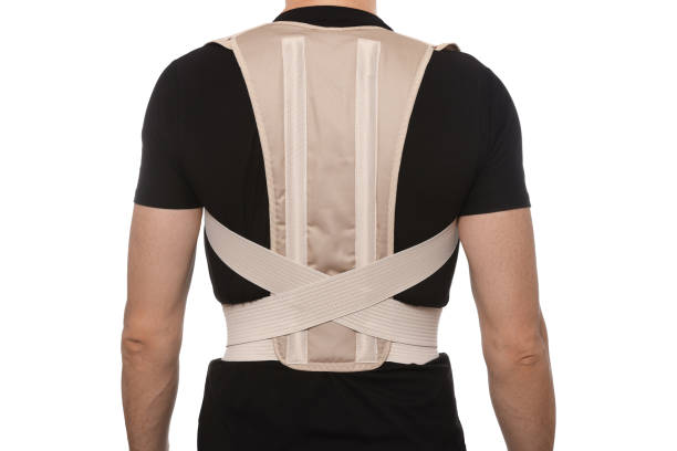 istock Closeup of man with orthopedic corset on white background, back view 1483686724
