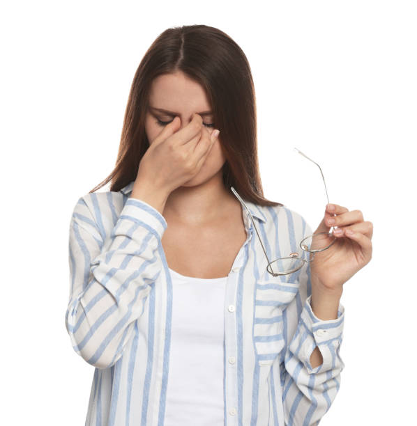 istock Young woman suffering from eyestrain on white background 1483686742