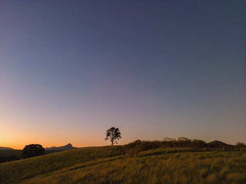 Sunset over a rolling landscape, Scenic Rim, Queensland, Australia
