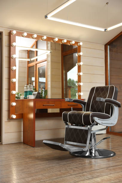istock Hairdressing salon interior with large mirror and chair 1483695295