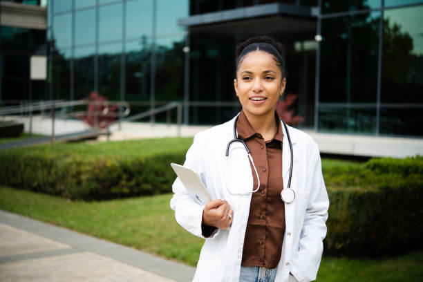 istock Portrait of a beautiful doctor  taking a break and using tablet 1483700496