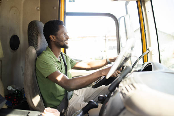 istock Young African American truck driver checking his route 1483700565