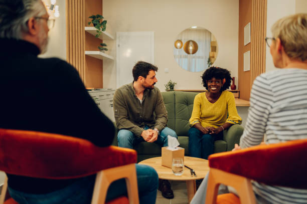istock African american woman psychologist on a group therapy session 1483701080