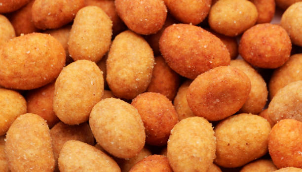 istock Close up of coated peanuts. 1483708241