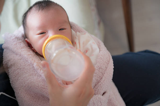 istock Cute japanese baby with mother 1483721716