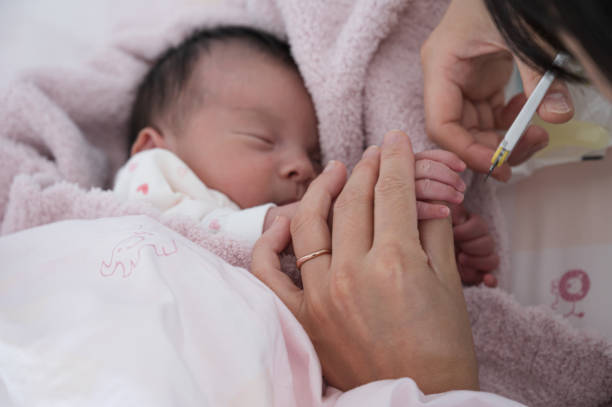istock Cute japanese baby with mother 1483723286