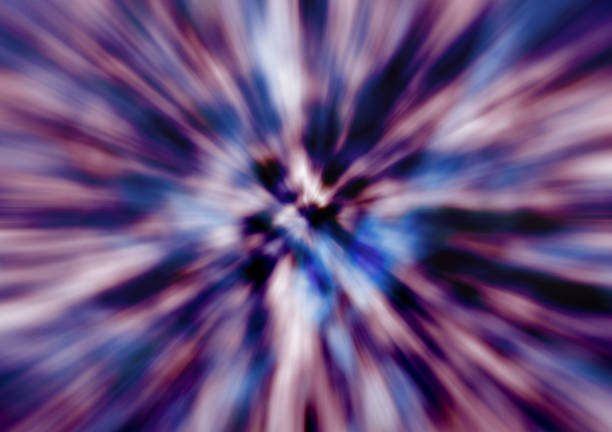 Abstract blurred background with zoom effect for graphic design. Purple, red and blue color motion.