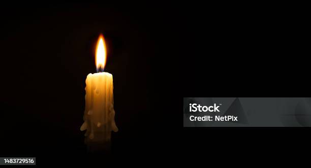 Burning Wax Candle Against A Black Background Stock Photo - Download Image Now - Backgrounds, Black Color, Broken Heart