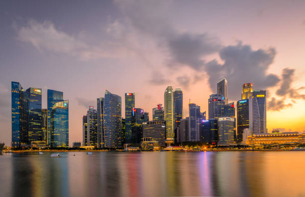 istock Vibrant sunset panorama background of central business district 1483729674