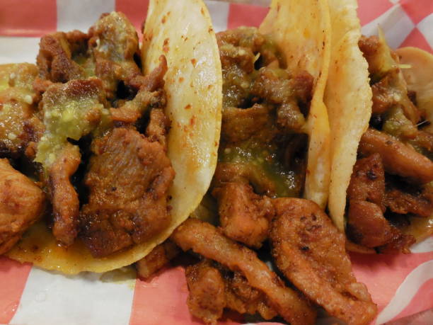 istock Three tacos al pastor ready to eat 1483729757