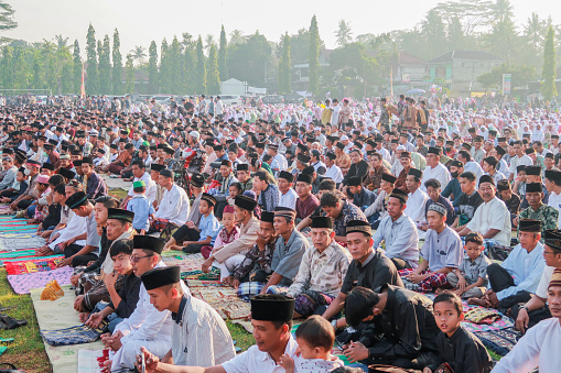 yogyakarta, indonesia, april 21, 2023 indonesian muslims are carrying out the Eid Al-Fitr prayer together in the field