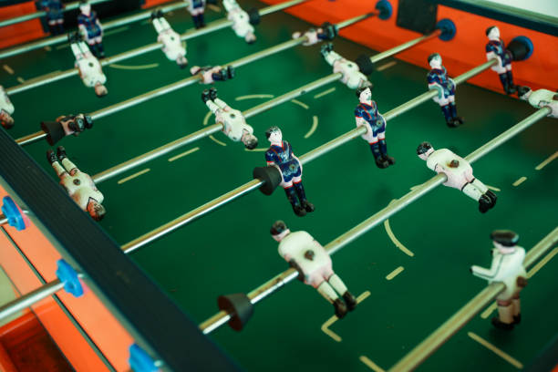 istock A foosball table is a recreational game symbolizing entertainment, skill, and socializing. It represents teamwork, competition, and the joy of play, and is often associated with bar and culture 1483731070