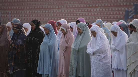 Kediri, East Java, Indonesia - April 21st, 2023 : Muslims are praying Idul Fitri in the morning.