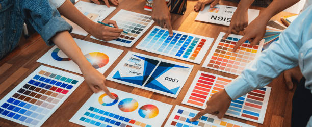 istock Graphic designer brainstorming logo and graphic arts at workshop. Scrutinize 1483745215