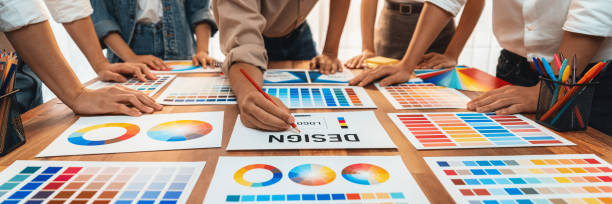 istock Graphic designer brainstorming logo and graphic arts at workshop. Scrutinize 1483745329
