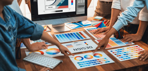 istock Graphic designer brainstorming logo and graphic arts at workshop. Scrutinize 1483745359
