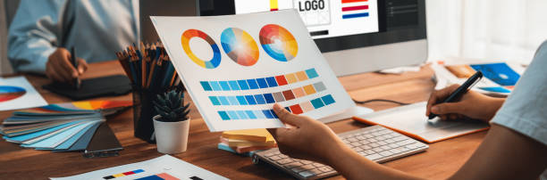 istock Graphic designer works on computer laptop with digital pen. Scrutinize 1483746370