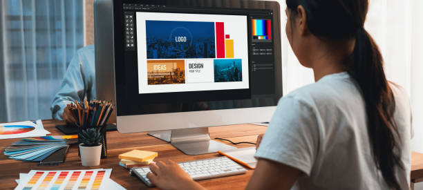 istock Graphic designer works on computer laptop with digital pen. Scrutinize 1483746431