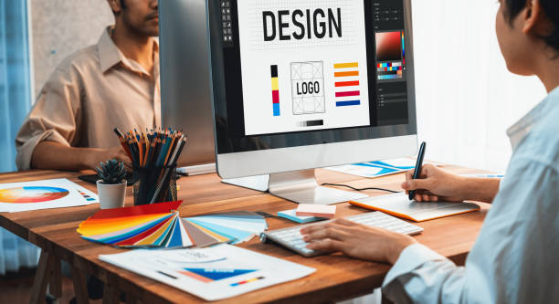 istock Graphic designer works on computer laptop with digital pen. Scrutinize 1483746590