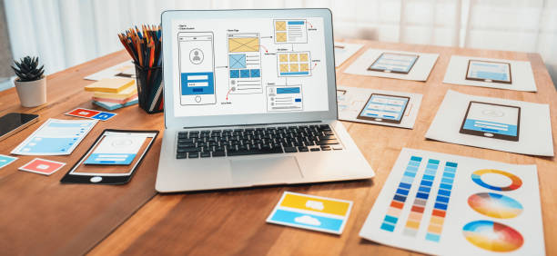 istock Digital wireframe design for web or mobile app UI on laptop. Scrutinize 1483746977
